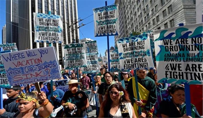 सैन फ्रांसिस्को में जलवायु सम्मेलन से हजारों लोग सड़कों पर उतरे