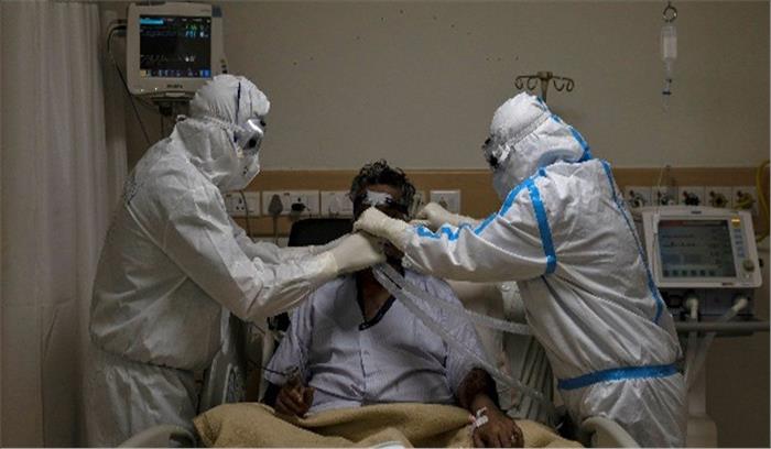 पिछले 24 घंटे में देश में कोरोना के 67,208 नए केस, 71 दिन में सबसे कम मामले