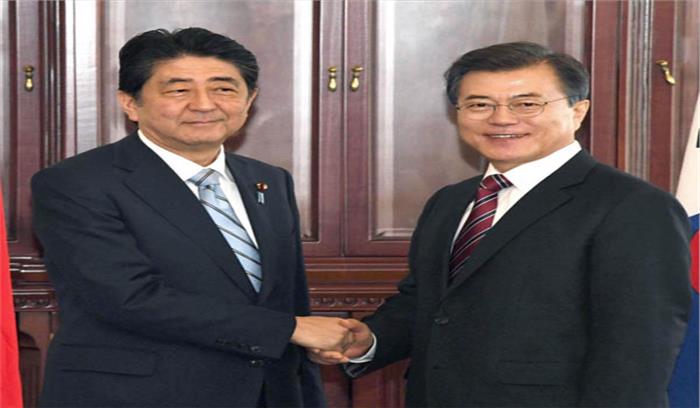 मून जेई इन उत्तर कोरिया पर दवाब बनाने के लिए सहमत: शिंजो अबे