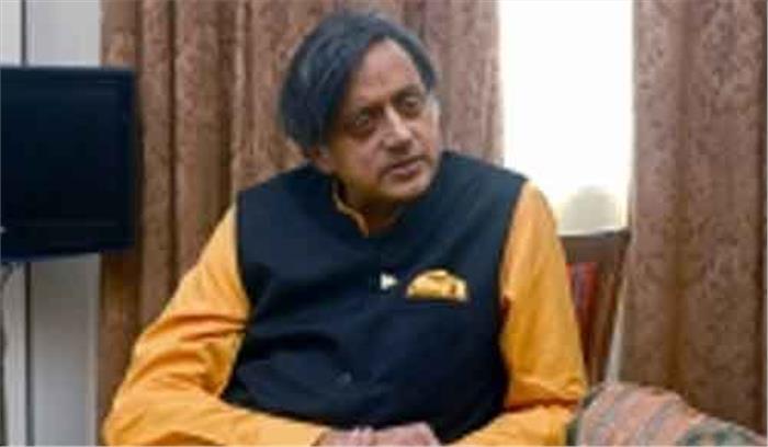 राष्ट्रपिता की जगह मोदी की तस्वीर  ब्रांड मोदी के प्रचार : थरूर