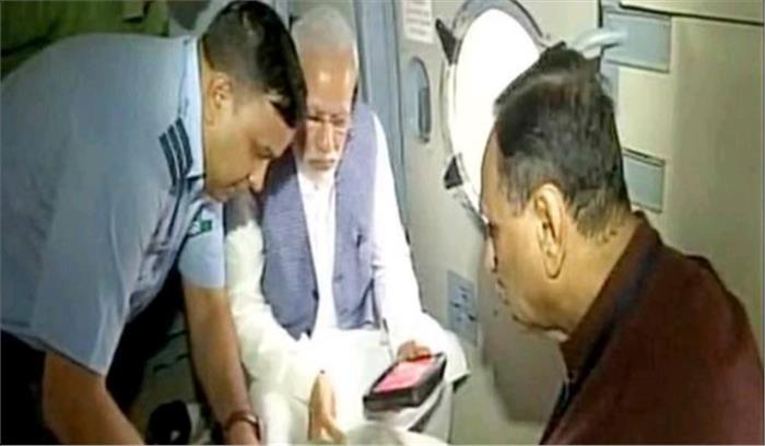 मोदी ने बाढ़ प्रभावित गुजरात का हवाई सर्वेक्षण किया, 500 करोड़ रुपये की मदद