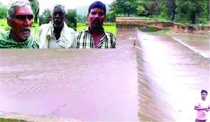 बांध ओव्हर-फ्लो, मिट्टी -पत्थर से पटे कई एकड़ खेत