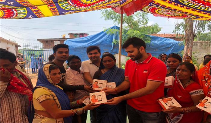 265 महिलाओं को फोन वितरित