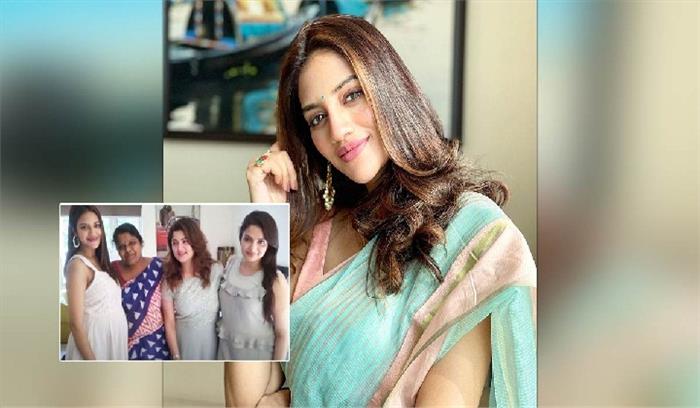 नुसरत जहां बेबी बंप को फ्लॉन्ट करती आईं नजर