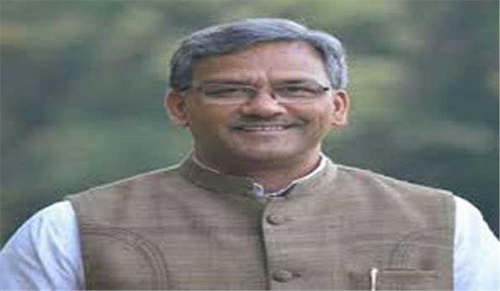 त्रिवेन्द्र ने कोरोना योद्धा की पत्नी को सौंपा 10 लाख रुपए का चेक