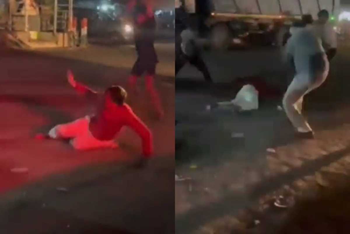 दबंगों ने बीच चौराहे पर पुलिस के सामने व्यक्ति को लाठी-डंडों से पीटा, वीडियो आया सामने