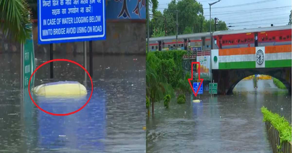 दिल्ली में तेज बारिश से मिंटो ब्रिज के नीचे जलभराव में डूबा ऑटो रिक्शा