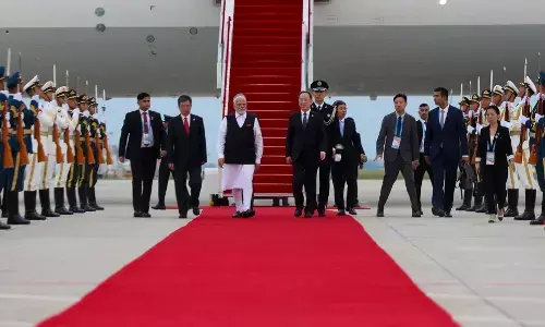 संतुलन साधने की कोशिश में शी जिनपिंग और मोदी की मुलाकात