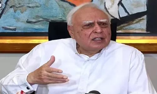 सिब्बल को मिला 2010 का पुरस्कार एप्स्टीन से था जुड़ा, बीजेपी ने राहुल गांधी पर साधा निशाना, जानिए कांग्रेस का जवाब