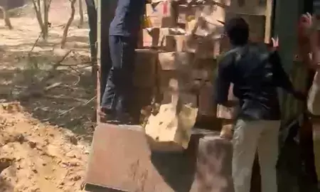 नोएडा में अवैध शराब पर एक्शन: हजारों लीटर शराब पर चला बुलडोजर; प्रशासन सख्त